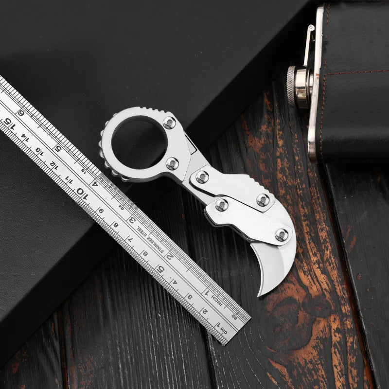 Mechanical claw portable knife
