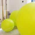 Giant bouncy tennis ball, tennis racket